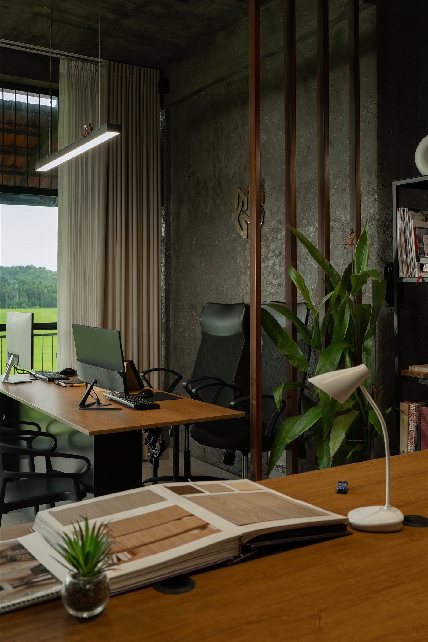 Inside the DIZA Architects office — the desks where the team works